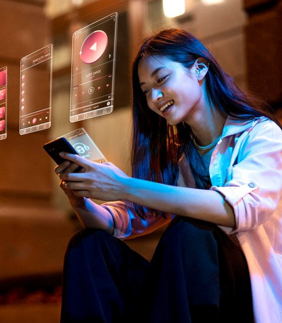  Media & Entertainment Data Management Platform young woman smiling at smartphone